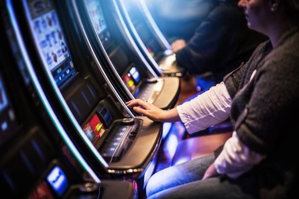 big77 mobile app interface showing live blackjack table and account dashboard on a smartphone screen