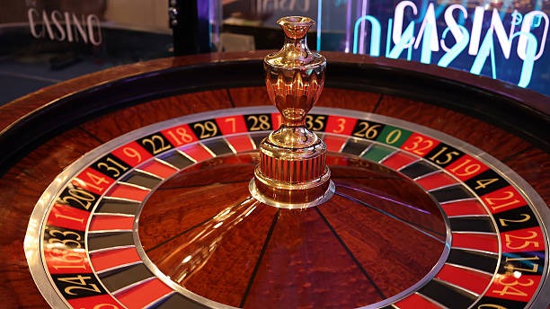 Mobile phone interface showing live baccarat betting controls and dealer video